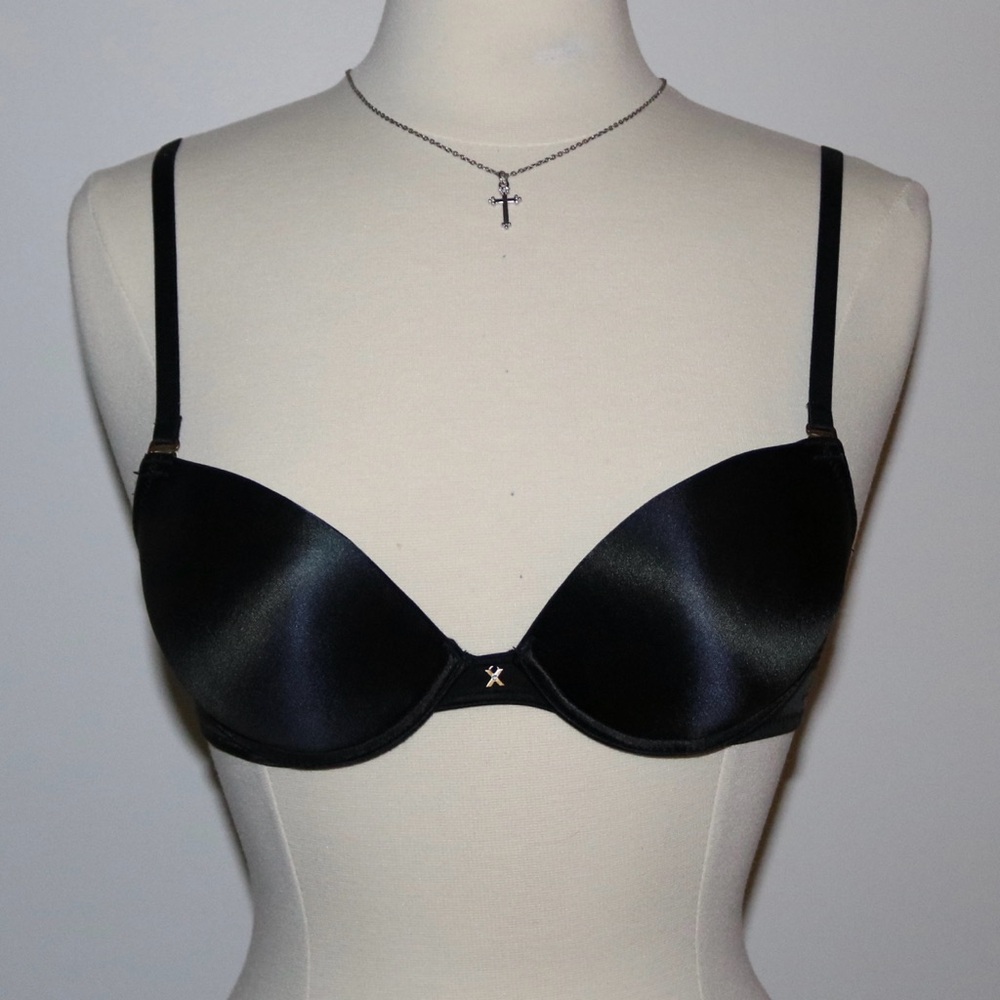 Frederick's of Hollywood black push-up bra with X charm